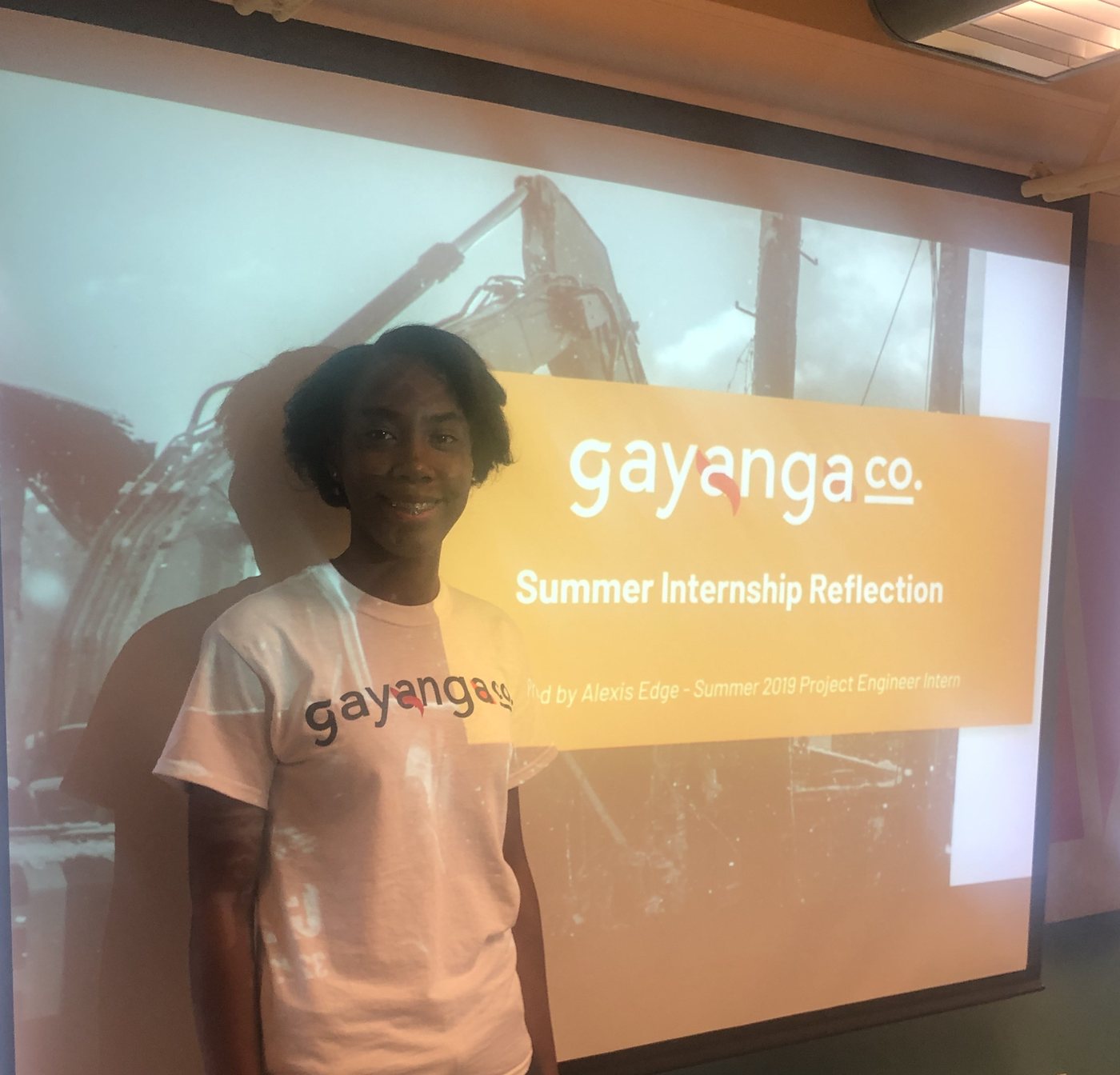 Alexis Edge, Gayanga's first engineering intern and Summer Intern of the Year, presenting her summer 2019 internship reflection at the company office