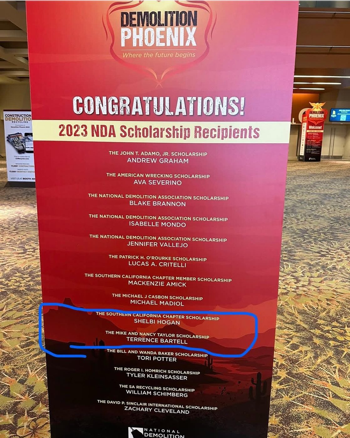 The National Demolition Association's 2023 scholarship board in Phoenix, with Gayanga interns Shelbi Hogan and Terrence Bartell among the recipients